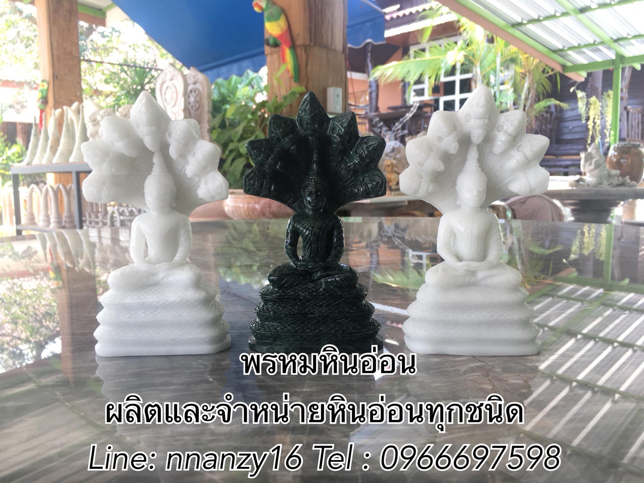 พระพุทธรูปหินอ่อน(ปางนาคปรก)