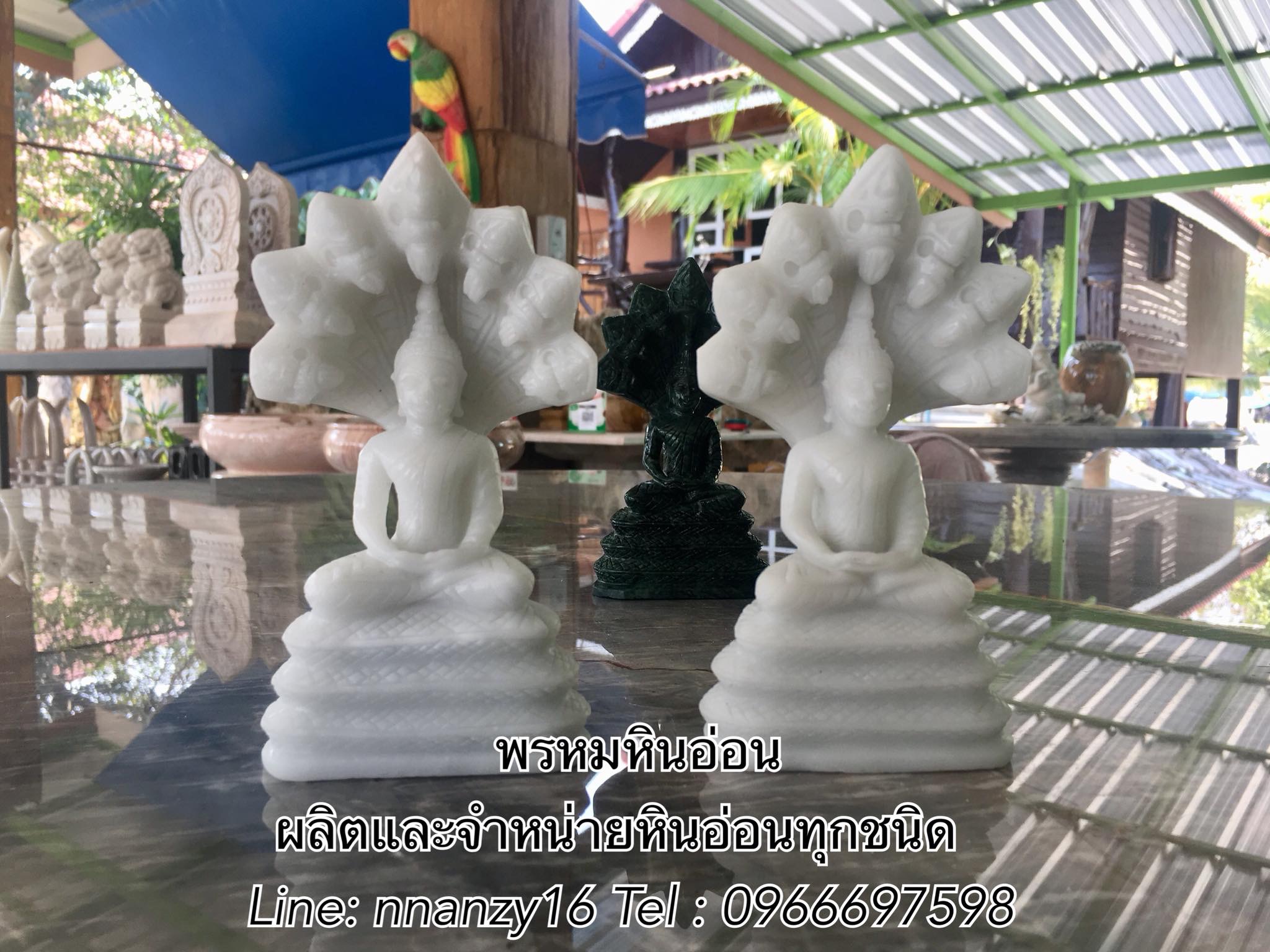 พระพุทธรูปหินอ่อน(ปางนาคปรก)